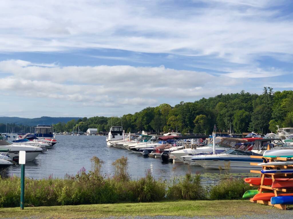 Boats docked on Lake George on a beautiful sunny day