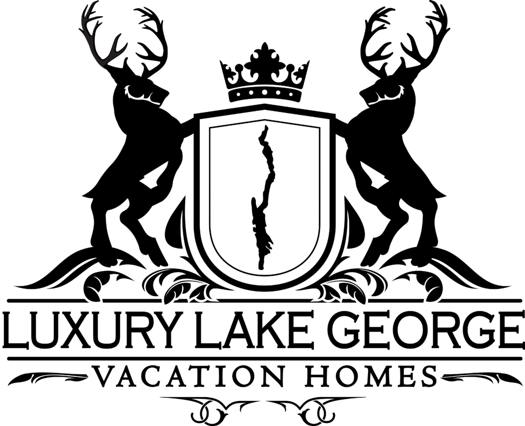 Logo: black background with a white shield outline containing a tall, jagged vertical emblem and antler motifs extending from the sides.