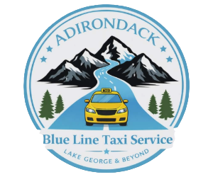 Logo for Adirondack Blue Line Taxi Service featuring mountains, a yellow taxi on a blue road, trees, and a circular badge reading 'ADIRONDACK', 'Blue Line Taxi Service', and 'Lake George & Beyond'.
