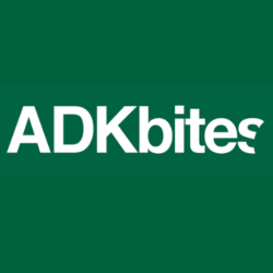 ADKbits logo: white bold text on dark green background.